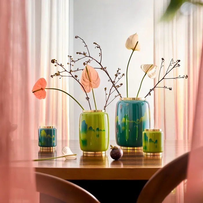 Hộp trà tròn Monument, hộp trà sơn mài cao cấp, hộp trà xanh lá, hộp trà Hanoia, hộp trà nắp đồng, quà tặng nghệ thuật cảm hứng vịnh Hạ Long